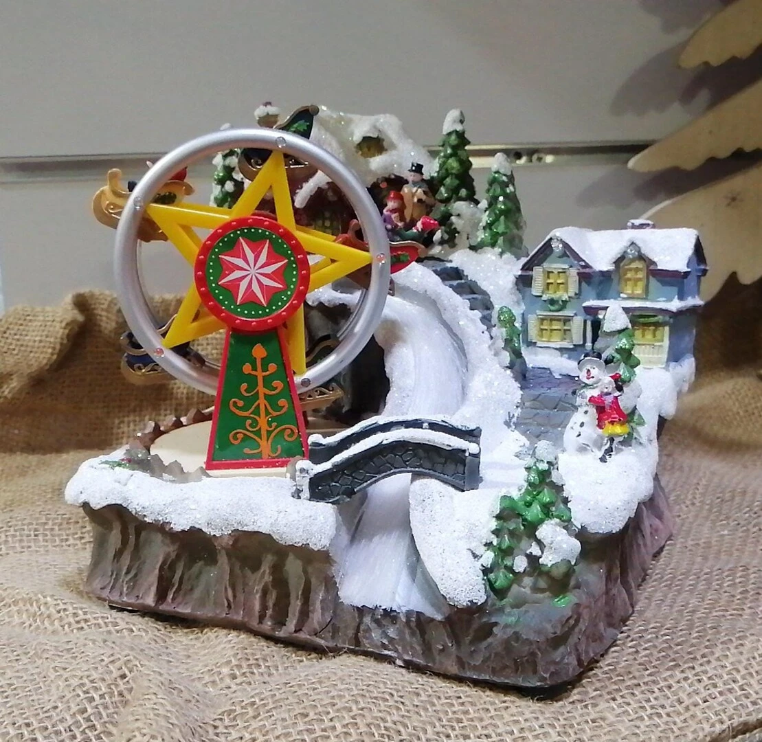 "NATALE" PAESAGGIO INNEVATO CON RUOTA PANORAMICA MUSICA E MOVIMENTO