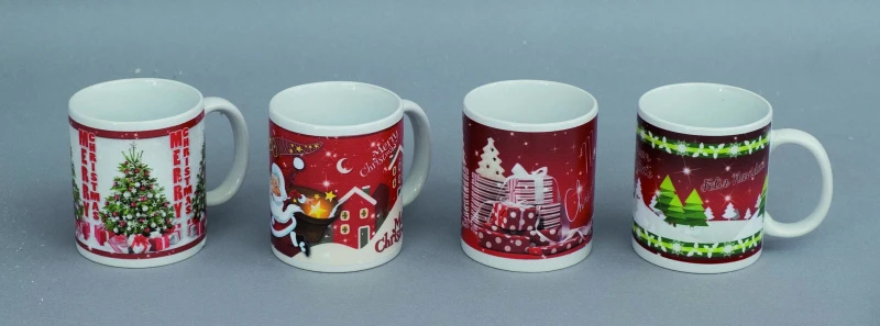 "NATALE" TAZZA CERAMICA CON DECORI NATALIZI CM 8X9.5 H ASSORTITE